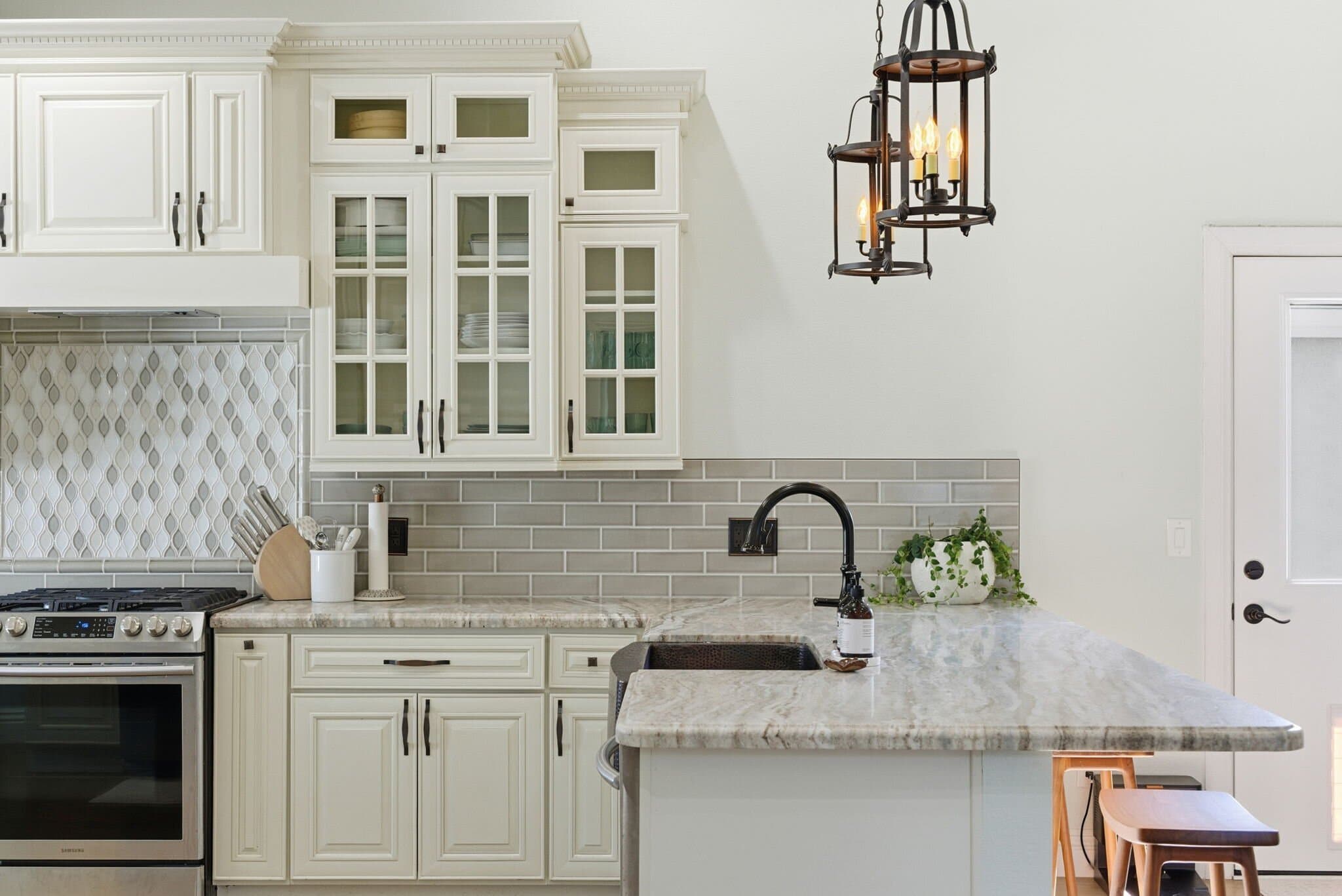 Bright open kitchen in a recent Ortiz Group listing, staged and shot for market